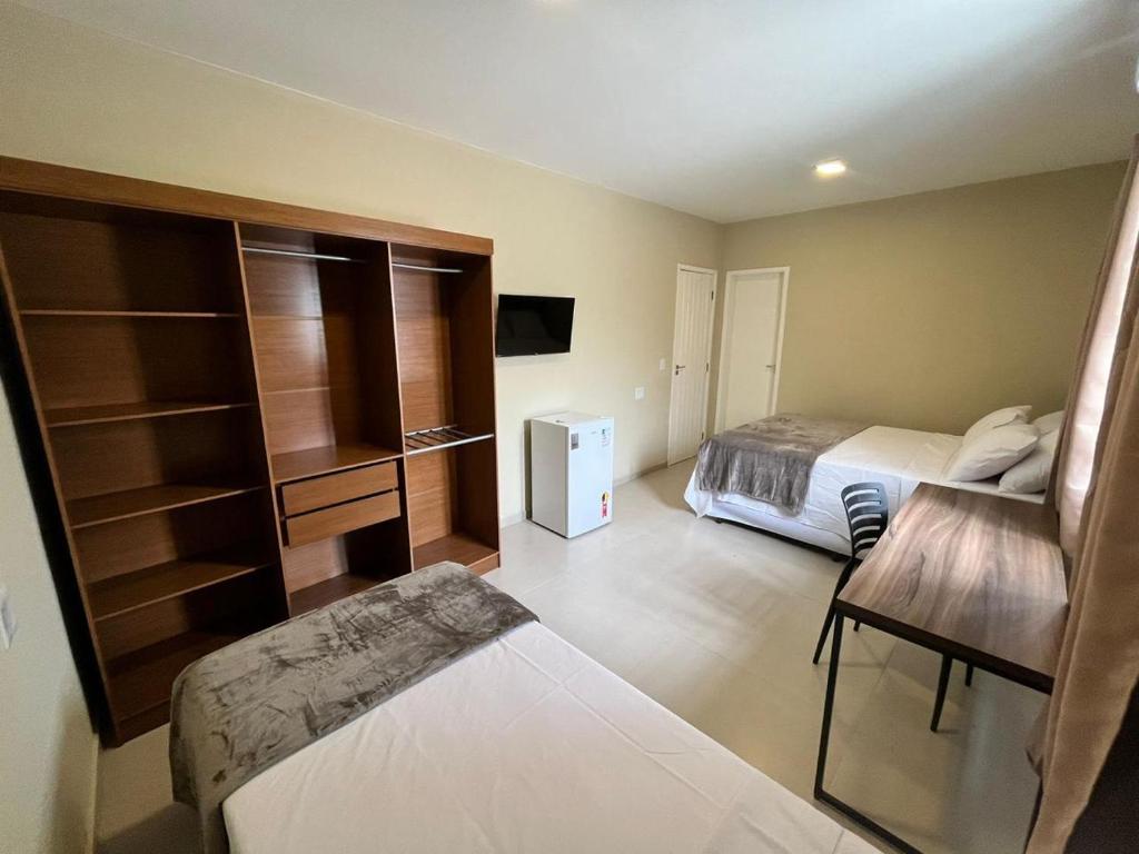 Deluxe com Cama Queen